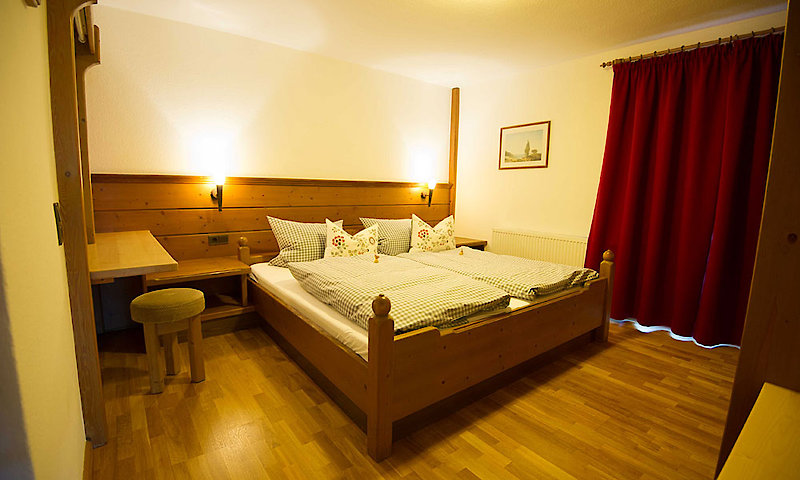Schlafzimmer - gemütliche Ferienwohnungen in Frauenau